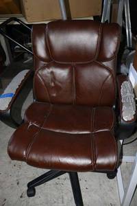 lot 530 image: Brown rolling office chair