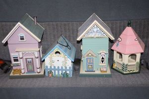 lot 535 image: Painted wood birdhouses