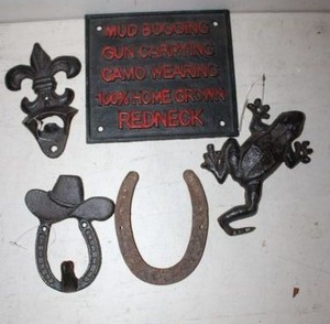lot 544 image: Cast iron sign and decor