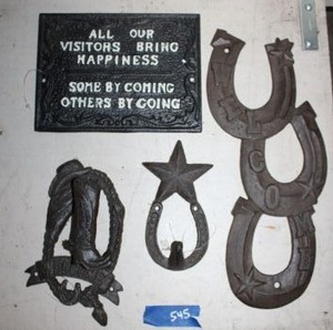 lot 545 image: Cast iron sign and decor