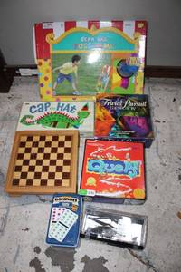 lot 552 image: Board games, dominoes, Chess, model helicopter