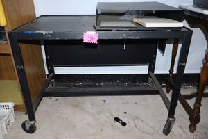 lot 579 image: Rolling metal table with attached metal box on top