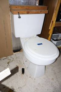 lot 582 image: Toilet as shown (missing back cover)