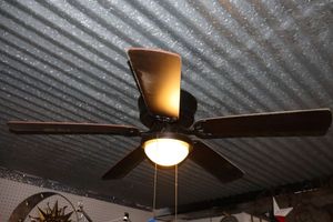 lot 615 image: Ceiling fan with light, fairly new - must bring tools and step ladder to remove