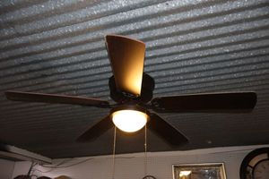 lot 616 image: Ceiling fan with light, fairly new - must bring tools and step ladder to remove