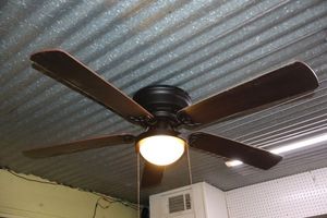 lot 617 image: Ceiling fan with light, fairly new - must bring tools and step ladder to remove