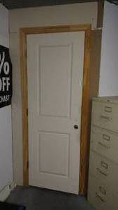 lot 631 image: 28 x 80 door plus frame. Bring tools to remove.