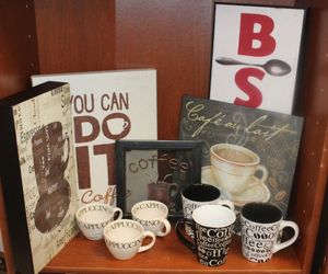 lot 26 image: Coffee Themed Decor Pieces and Coffee Cups