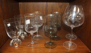 lot 30 image: Two Vintage Fostoria Ice Tea Glasses, Two Vintage Lenox Intrigue Wine Glasses with Gold Rim, Two Vintage Lenox Green Mist Wine Crystal Wine Glasses and Two Vintage Vivendi Burgundy Wine Glasses by Mikasa