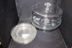 lot 71 image: Vintage Princess House Heritage Pedestal Cake Stand with Etched Floral Dome Lid and Anchor Hocking Laurel Plates. Blown Glass Approx 11.5 inch diameter and Approx 9 inch High