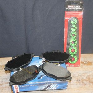lot 94 image: Brake Pads and Fuel line adaptors