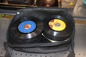 lot 128 image: Bag full of 45 records