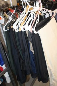 lot 193 image: Variety of Styles and Sizes of Mens Slacks
