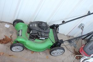 lot 4 image: Lawn Boy walk behind gas lawn mower 20 inch cutting deck, Deep Dome Deck designed for superior mulching and bagging performance (no bag), Briggs &amp Stratton engine, Compact folding handle for easy storage