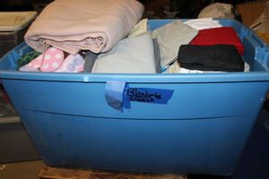 lot 55 image: Large tote of Linens, Sheets, blankets and more (tote not included)