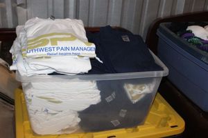 lot 46 image: Tote Full of shirts (tote not included)