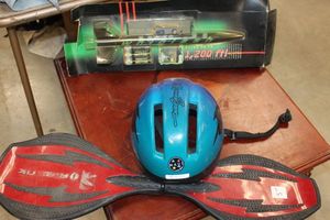lot 35 image: Razor Ripstick and Helmet and rocket