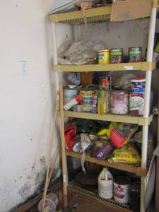 lot 29 image: shelf contents included, wood finish yard chemicals and more