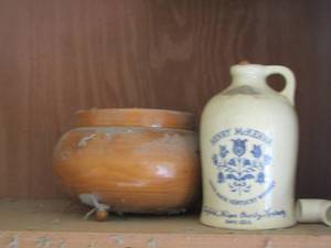lot 30 image: wooden bowl, henry McKenna Kentucky whiskey bottle