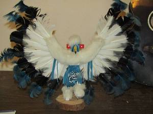 lot 124 image: blue and black feather Kachina doll