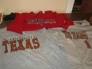 lot 140 image: Texas tech and Texans shirts