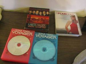 lot 141 image: Star Trek Voyager dvds qty 2  , law and order movie series,   in plain sight movie series
