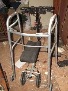 lot 417 image: walker and knee scooter