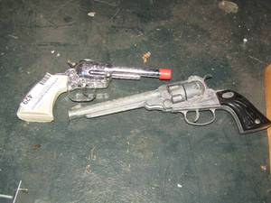lot 429 image: Cap Guns  qty 2 plastic
