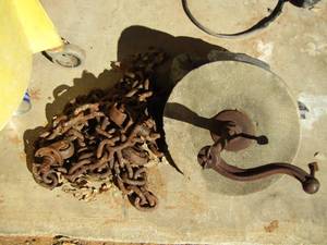 lot 485 image: GRINDING STONE  & CHAIN