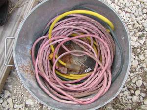 lot 93 image: bucket with extension cords