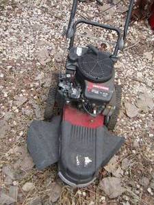 lot 113 image: Craftsman 6.75 Briggs and Stratton LAWN  STRING MOWER