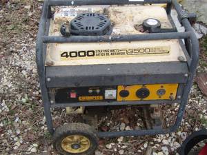 lot 11 image: Champion Portable generator 4000 starting watts unknown working condition- recoil needs reattachment