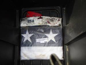 lot 152 image: American flag in package 18 L X 24 H