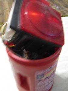 lot 88 image: bucket of various tail lights