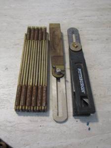lot 55 image: FOLDING YARD STICK,  BOX CUTTERS