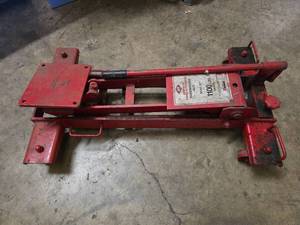 lot 9 image: American Forge & Foundry Transmission Jack, Model 3170.  Needs Repair