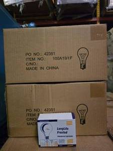 lot 210 image: 4 Boxes of NEW Incandescent 100W Light Bulbs.  4 Bulbs Per Pack & 30 Packs Per Box.