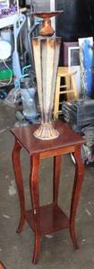 lot 9 image: two-tier pedestal stand or side table. With candle holder