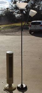 lot 13 image: black metal torchiere floor lamp with a side reading light and frosted plastic shades.  And Aloha Breeze Tower fan
