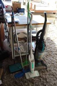 lot 14 image: floor cleaning appliances, including an upright vacuum cleaner and a steam mop.