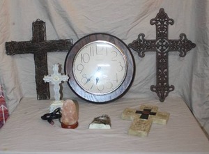 lot 20 image: decorative crosses of varying designs,a clock and a light up salt Rock and more