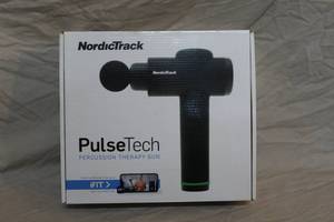 lot 26 image: NordicTrack PulseTech Percussion Therapy Gun.