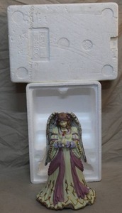 lot 30 image: Hand painted ceramic angel music box