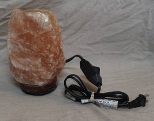 lot 38 image: natural Himalayan salt lamp with a cord and plug.soda in one picture to show size