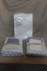 lot 49 image: To set of Twin sheets and mattress pad no leak 66x52