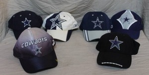 lot 54 image: vintage Dallas Cowboys NFL hats.