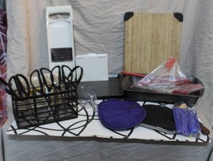 lot 75 image: Metal basket and kitchen scissors and Pampered Chef Ultimate Mandoline food slicer. Wood cutting board and much more see pictures