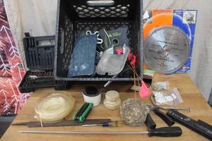lot 93 image: Milk crate full of miscellaneous tools like long screwdriver Allen wrench set.  saw blade  and more see pictures