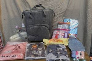 lot 112 image: Back pack bag with a mix of kids close a variety of sizes