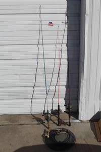 lot 142 image: Fishing pole and basket see pictures for brands
